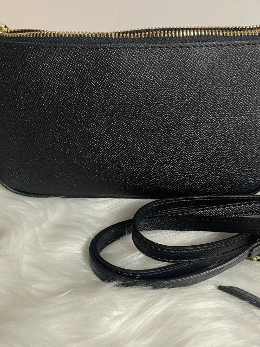 Black zipper top small shoulder bag with extra long strap